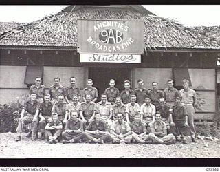 LAE, NEW GUINEA, 1945-12-21. STAFF OF THE AUSTRALIAN ARMY AMENITIES SERVICE RADIO STATION 9AB