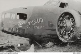 BATCHELOR, NT. MAY 1943. LOCKHEED HUDSON A16-211, "THE TOJO BUSTERS" WHICH SERVED ALL THROUGH THE MILNE BAY CAMPAIGN, ARRIVING AT NO 2 SQUADRON RAAF. SHOWN HERE AFTER CRASH LANDING AT MILLINGIMBI ..