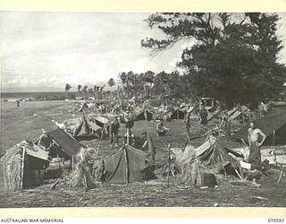 DALLMAN RIVER, NEW GUINEA, 1944-02-21. "SHANTY TOWN", CAMP SITE OF THE 30TH INFANTRY BATTALION RESTING AT THE DALLMAN RIVER