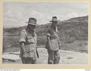 NADZAB, NEW GUINEA. 1945-05-11. GENERAL SIR THOMAS A. BLAMEY, COMMANDER-IN-CHIEF, ALLIED LAND FORCES, SOUTH WEST PACIFIC AREA (1), ACCOMPANIED BY LIEUTENANT COLONEL D.H. DWYER (2), RETURN TO THEIR ..