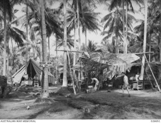 MILNE BAY, PAPUA. 1942-09. CAMOUFLAGED WORKSHOPS OF 101 INDEPENDENT BRIGADE GROUP WORKSHOPS IN THE MILNE BAY AREA