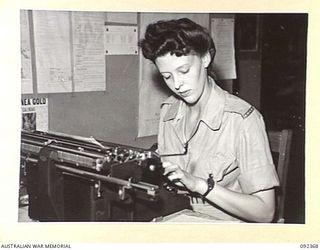 LAE, NEW GUINEA, 1945-05-23. SERGEANT J.M. THOMSON, STENOGRAPHER, AUSTRALIAN WOMEN'S ARMY SERVICE WORKING AT FIRST ARMY SURVEY. AUSTRALIAN WOMEN'S ARMY SERVICE PERSONNEL ARE AT LAE TO RELEASE MEN ..