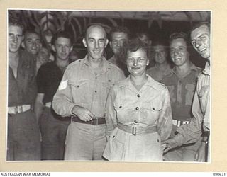 TOROKINA, BOUGAINVILLE. 1945-04-16. THE DANCE HELD AT OTHER RANKS CLUB, HALSEY FIELD, PROVIDED AN UNEXPECTED BIRTHDAY PARTY FOR PRIVATE W. ATKINS, AUSTRALIAN ARMY MEDICAL WOMEN'S SERVICE