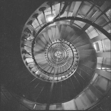 Circular staircase inside the lighthouse on the Isle of Pines, New Caledonia, 1967 / Michael Terry