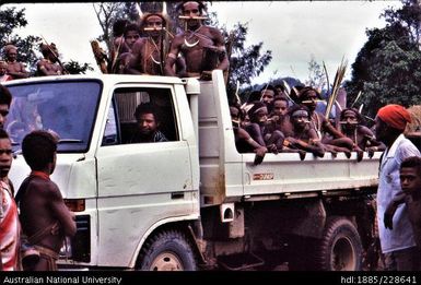 Febi arriving by truck to the Koroba Provincial High School for the end of year district cultural celebrations