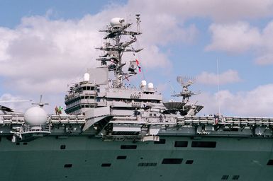 Close-in port side view of the island structure of the nuclear-powered aircraft carrier USS ABRAHAM LINCOLN (CVN 72) as the ship departs Pearl Harbor to take part in Operation RIMPAC 2000 in the waters to the south of the Hawaiian Islands