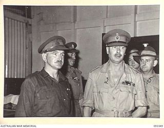 LAE AREA, NEW GUINEA, 1945-06-30. DURING HIS TOUR OF INSPECTION OF AUSTRALIAN TROOPS IN THE LAE AREA, HIS ROYAL HIGHNESS, THE DUKE OF GLOUCESTER, GOVERNOR-GENERAL OF AUSTRALIA (2) VISITED THE ..