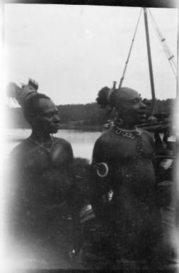 Two men in front of the Balangot [?], Ramu River, New Guinea, 1935 / Sarah Chinnery