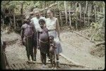 Marek Jablonko and Allison Jablonko with a family in Tsembaga