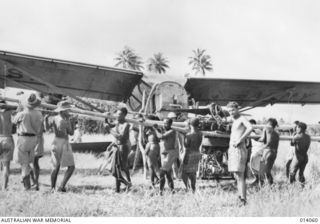 1943-01-11. SALVAGING AEROPLANES IN NEW GUINEA. LITTLE IS HEARD OF THE GROUND STAFF OF THE RAAF - THE MEN WHO WORK ALL HOURS AND UNDER ALL CONDITIONS, KEEPING OUR PLANES IN THE AIR, AND STILL LESS ..