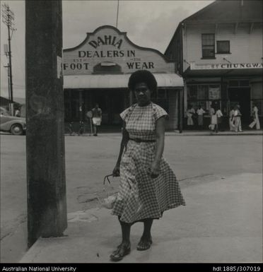 Woman walking through town