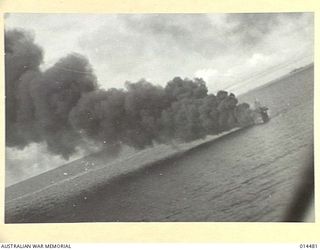 1943-03-22. BISMARCK SEA BATTLE. ALLIES SMASH JAP CONVOY. AN RAAF BEAUFIGHTER ATTACKS A BURNING JAPANESE SHIP