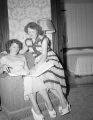 Pen pals, two women looking at book, Padua, IL 1951