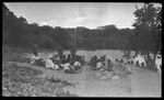 Officers, and a group of men on the beach