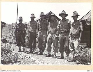 LAE, NEW GUINEA. 1945-11-3. FORMOSAN PRISONERS OF WAR WHO ARE CAMP LEADERS AT 20 PRISONER OF WAR CAMP, LAE