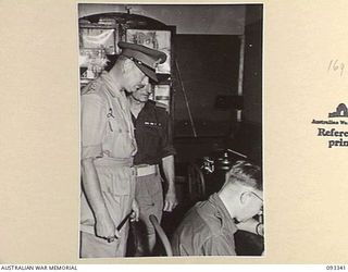 LAE AREA, NEW GUINEA, 1945-06-30. DURING HIS TOUR OF INSPECTION OF AUSTRALIAN TROOPS IN THE LAE AREA, HIS ROYAL HIGHNESS, THE DUKE OF GLOUCESTER, GOVERNOR-GENERAL OF AUSTRALIA (2) VISITED THE CORPS ..