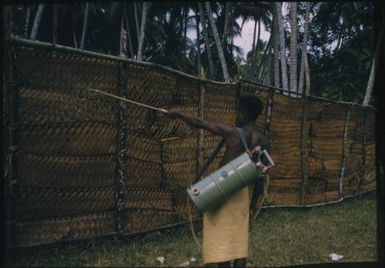 Practising spraying : D'Entrecasteaux Islands, Papua New Guinea, 1956-1959 / Terence and Margaret Spencer