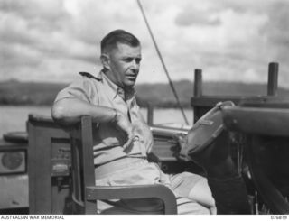 JACQUINOT BAY, NEW BRITAIN. 1944-11-08. LIEUTENANT-COMMANDER C.G. HILL, ROYAL AUSTRALIAN NAVAL RESERVE, SUPPLY AND SECRETARIAT BRANCH (NAVAL), COMMANDER OF THE RAN FRIGATE BARCOO