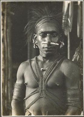 Types from the villages of Urama, Kinomere & Tovei [Man standing and looking directly at camera]