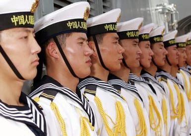 Chinese Peoples Liberation Army Navy Sailors from the Luhu Class (Type 052) Guided Missile Destroyer QINGDAO (DDG 113) stand in formation as their ship arrives at Naval Station Pearl Harbor, Hawaii, for a Goodwill Visit on Sept. 6, 2006. The visit provides an excellent opportunity to enhance cooperation between the two navies and underscores the United States commitment to supporting ongoing cooperative efforts in the Pacific Region. (U.S. Navy photo by CHIEF Mass Communication SPECIALIST David Rush) (Released)