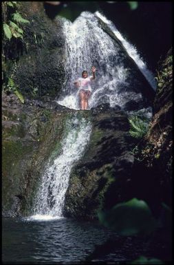 Woman in waterfall, Rarotonga