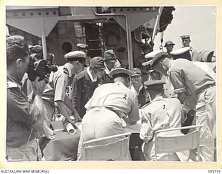 AT SEA OFF RABAUL, NEW BRITAIN. 1945-09-04. PRE- SURRENDER DISCUSSIONS ABOARD HMAS VENDETTA AT A SEA RENDEZVOUS OFF RABAUL BETWEEN REPRESENTATIVES OF LIEUTENANT GENERAL V.A.H. STURDEE, GENERAL ..