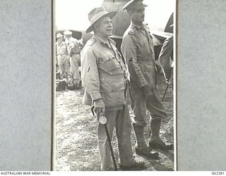 DUMPU, NEW GUINEA. 1943-12-19. VX1 GENERAL SIR THOMAS BLAMEY, GBE., KCB., CMG., DSO., ED., COMMANDER-IN-CHIEF, ALLIED LAND FORCES, SOUTH WEST PACIFIC AREA (1) BEING GREETED ON HIS ARRIVAL AT THE ..