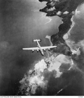 SALAMAUA, NEW GUINEA. 1943-08-03. STRIKE ON TOWNSHIP BY LIBERATORS OF THE FAMOUS "BELLES" FROM THE 90TH BOMBER GROUP, FIFTH AIR FORCE, UNITED STATES ARMY AIR FORCE