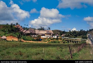 Fiji - hillside with local buildings