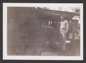 [Two Servicemen in Front of Shed]