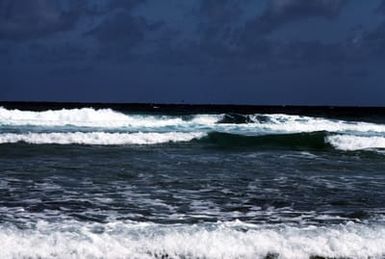 A view of waves breaking on a beach