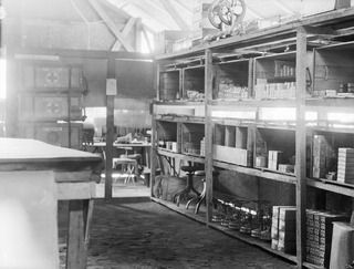 TOROKINA, BOUGAINVILLE, 1945-06-21. THE INTERIOR OF DETAIL NEW GUINEA SUB DEPOT, LHQ DENTAL STORES, HQ 4 BASE SUB AREA. PHOTOGRAPH TAKEN AT REQUEST OF DR. WORNER, VISITING AUSTRALIAN SCIENTIST