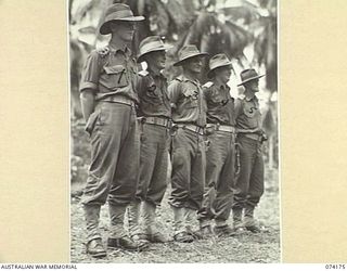 SIAR, NEW GUINEA. 1944-06-22. OFFICERS OF C COMPANY, 57/60TH INFANTRY BATTALION. THEY ARE:- VX17616 LIEUTENANT J. STIRLING (1); VX81105 LIEUTENANT A.J. MELLETT (2); VX114142 CAPTAIN J.H. NEWSTEAD ..