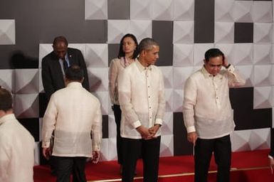 Barack Obama joins Asia Pacific Economic Cooperation Summit leaders and spouses for a group photo in Pasay, Metro Manila, Philippines, November 18, 2015