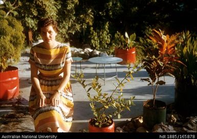 Woman photographed in garden