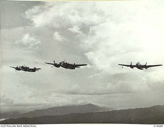 1943-04-16. NEW GUINEA. MILNE BAY. BEAUFORT BOMBERS PRACTICE AT MILNE BAY. (NEGATIVE BY N. BROWN)