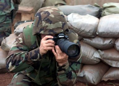 US Marine Corps STAFF Seargent Charles F. Wolf, Head Quarter's Battalion, documents 1ST Battalion, 3rd Marines, training exercises at Schofield Army Barracks, Hawaii