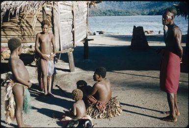 Kas Kas Island (note elongated head of man head-bound as a baby) : New Britain coastline, Papua New Guinea, 1960 / Terence and Margaret Spencer