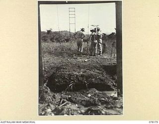 LAE, NEW GUINEA. 1945-01-03. VX104290 LIEUTENANT-COLONEL H. BRIDGE, CHIEF SIGNAL OFFICER, FIRST AUSTRALIAN ARMY (1), TX6213 MAJOR C.L. REED, CHIEF SIGNAL OFFICER'S BRANCH FIRST AUSTRALIAN ARMY (2) ..