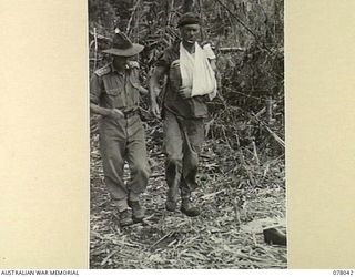 BOUGAINVILLE ISLAND. 1944-12-30. QX58435 PRIVATE A.R.J. COOK, A COMPANY, 25TH INFANTRY BATTALION, WHO WAS WOUNDED DURING THE AUSTRALIAN ATTACK ON JAPANESE POSITIONS IN THE PIATERAPAIA SECTOR BEING ..