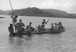 Roger Revelle, Robert Dietz, and Russell W. Raitt on their way back to Viti Levu, after a day of diving with the Fijians on Serua Island