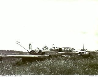 NEW BRITAIN, 1945-09. WRECKAGE OF A JAPANESE G4M1 MITSUBISHI "BETTY" BOMBER AIRCRAFT IN THE RABAUL/GAZELLE PENINSULA AREA. (RNZAF OFFICIAL PHOTOGRAPH.)