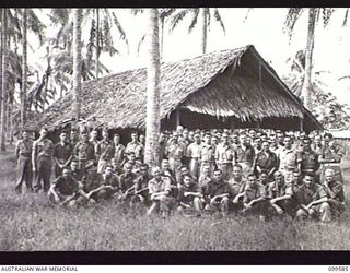 LAE, NEW GUINEA, 1945-12-23. MEMBERS OF THE CONGREGATION OUTSIDE THE BUSU ROMAN CATHOLIC CHAPEL, LAE BASE SUB AREA