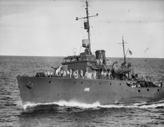 AT SEA. 1944-09/08. THE RAN CORVETTE, COLAC PROCEEDING AT FULL SPEED TO ATTEND TO AN ALARM WHILE ON CONVOY DUTY ALONG THE COAST OF NEW GUINEA