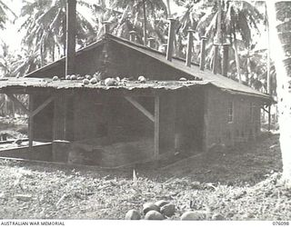KARKAR ISLAND, NEW GUINEA. 1944-09-20. A HOT AIR COPRA KILN. THE PLANTATION, NEGLECTED DURING 2 YEARS OF JAPANESE OCCUPATION, IS BEING REESTABLISHED BY NATIVES WORKING UNDER THE DIRECTION OF THE ..