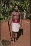 Busumae of Furisi'ina with afui, alafolo, club and old police belt