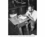 Dr. J. P. E. Morrison logging findings aboard the LSM 382 near Rongerik Island, summer 1947