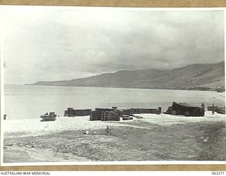 WALINGAI BEACH, NEW GUINEA. 1944-01-02. VIEW OF THE COAST AND FORTIFICATION POINT SEEN FROM THE BEACH (TO JOIN TO PHOTOGRAPH NO. 63272)