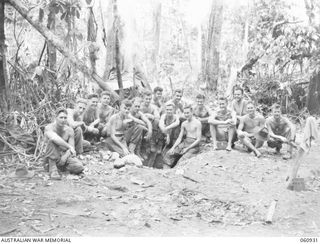 NEW GUINEA. 1943-11-28. SIGNALS GROUP OF HEADQUARTERS, 24TH AUSTRALIAN INFANTRY BRIGADE. THEY ARE: NX56881 SERGEANT W. J. CULLEN (1); SX6733 SIGNALMAN J. A. HELPS (2); QX10010 SIGNALMAN. C. J. ..