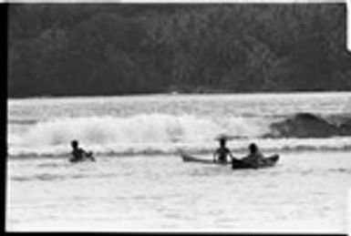 Canoeing in surf